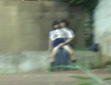 Asian sweetie and her guy having sex on the steps outside picture 15