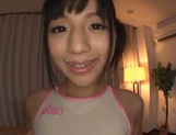 Petite Asian AV girl Hitomi Miyano gets oiled and enjoys pussy rubbing
