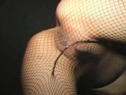 Yummy hottie Kaoruko demonstrates anal and pussy in fishnet pantyhose
