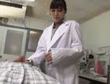 Sexy Japanese woman doctor deepthroats her patient picture 11