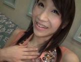 Charning Japanese milf plays with toys and with pecker picture 12