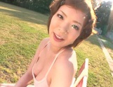 Short-haired milf Nao Mizuki rides her lover?s cock on pov outdoors picture 1