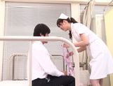 Asian nurse with curly hair Arisa Nakano makes cock massage picture 1
