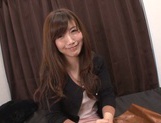 Cute Japanese lady makes a footjob and handjob and gets banged picture 14