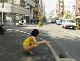 Sweet Asian girl exposes her fine ass on the street picture 2