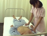 Nice looking Asian nurse with tiny tits has sex with a mature patient picture 12