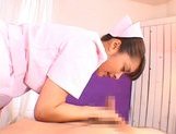 Brave Japanese nurse Mihiro massages and sucks cock on pov picture 11