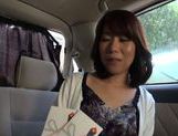 Naughty Japanese Milf Gives Handjob In The Car picture 12