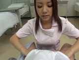 Kinky Japanese nurse Riona Kamijyou gives a titfuck on POV picture 11