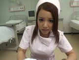 Kinky Japanese nurse Riona Kamijyou gives a titfuck on POV picture 12