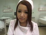 Kinky Japanese nurse Riona Kamijyou gives a titfuck on POV picture 16
