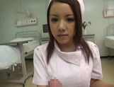 Kinky Japanese nurse Riona Kamijyou gives a titfuck on POV picture 18
