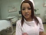 Kinky Japanese nurse Riona Kamijyou gives a titfuck on POV picture 19