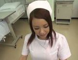 Kinky Japanese nurse Riona Kamijyou gives a titfuck on POV picture 32