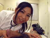 Adorable Japanese nurse Aira Masaki teases cock in handjob picture 11