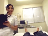 Adorable Japanese nurse Aira Masaki teases cock in handjob picture 1