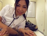 Adorable Japanese nurse Aira Masaki teases cock in handjob