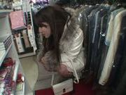 Exquisite Saki Kobashi engulfs cock in a clothing store
