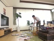 Busty Japanese housewife gives head and enjoys titfuck