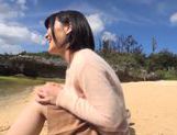 Busty Asian milf Kazari Hanasaki sucks schlong on a beach picture 12