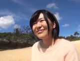 Busty Asian milf Kazari Hanasaki sucks schlong on a beach picture 13