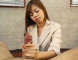 Appetizing Japanese office girl jerks off huge dick picture 13