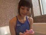 Attractive young chick Hitomi rubs her horny slit in a bathroom