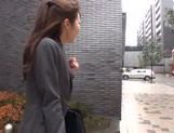 Skinny Japanese office girl sucks cock in a car picture 24