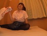 Sweet Japanese teen is having fun with sex toy