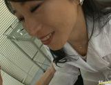 Horny guy gets a nice treatmen by a babetie nurse called Natsumi Kitahara. picture 8