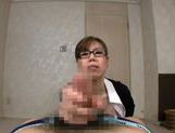 Mature Japanese AV Model is a busty babe stroking cock picture 45