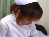 Hot Asian nurse has sex at work