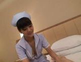 Hot Asian nurse shows off cute ass picture 36