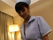 Hot Asian nurse shows off cute ass