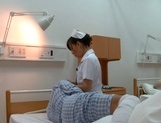 Amateur Asian nurse enjoys hot fucking on camera picture 21
