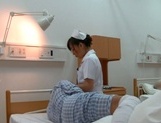 Amateur Asian nurse enjoys hot fucking on camera picture 22
