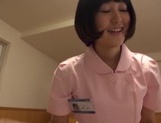 Naughty Asian nurse Yuu Shinoda gives a foot job and bounces on cock picture 18