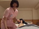 Naughty Asian nurse Yuu Shinoda gives a foot job and bounces on cock