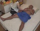 Japanese AV Model dressed as a maid massages old man picture 12