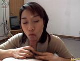 Yuuki Mori Asian babe gives a blowjob picture 11