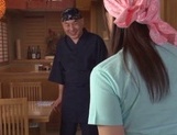 Tempting tavern clerk Rina Araki sucks cock and fondles it with tits picture 18