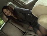 Yuu Kanda Asian babe is in the car with black stockings