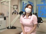 Asian nurse with big tits hides behind a mask