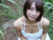 Pretty short-haired babe Airi Suzumura plays with cock