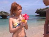 Teen Japanese AV Model gets into a headfuck on the beach picture 12