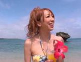 Teen Japanese AV Model gets into a headfuck on the beach picture 13