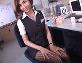 Gorgeous office milf Akari Asahina gives an arousing footjob picture 16