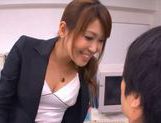 Naughty Asian office worker gives a blowjob