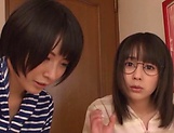 Alluring Japanese babes sharing cock during live show  picture 35