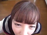 Japanese schoolgirl is giving a tit fuck picture 13